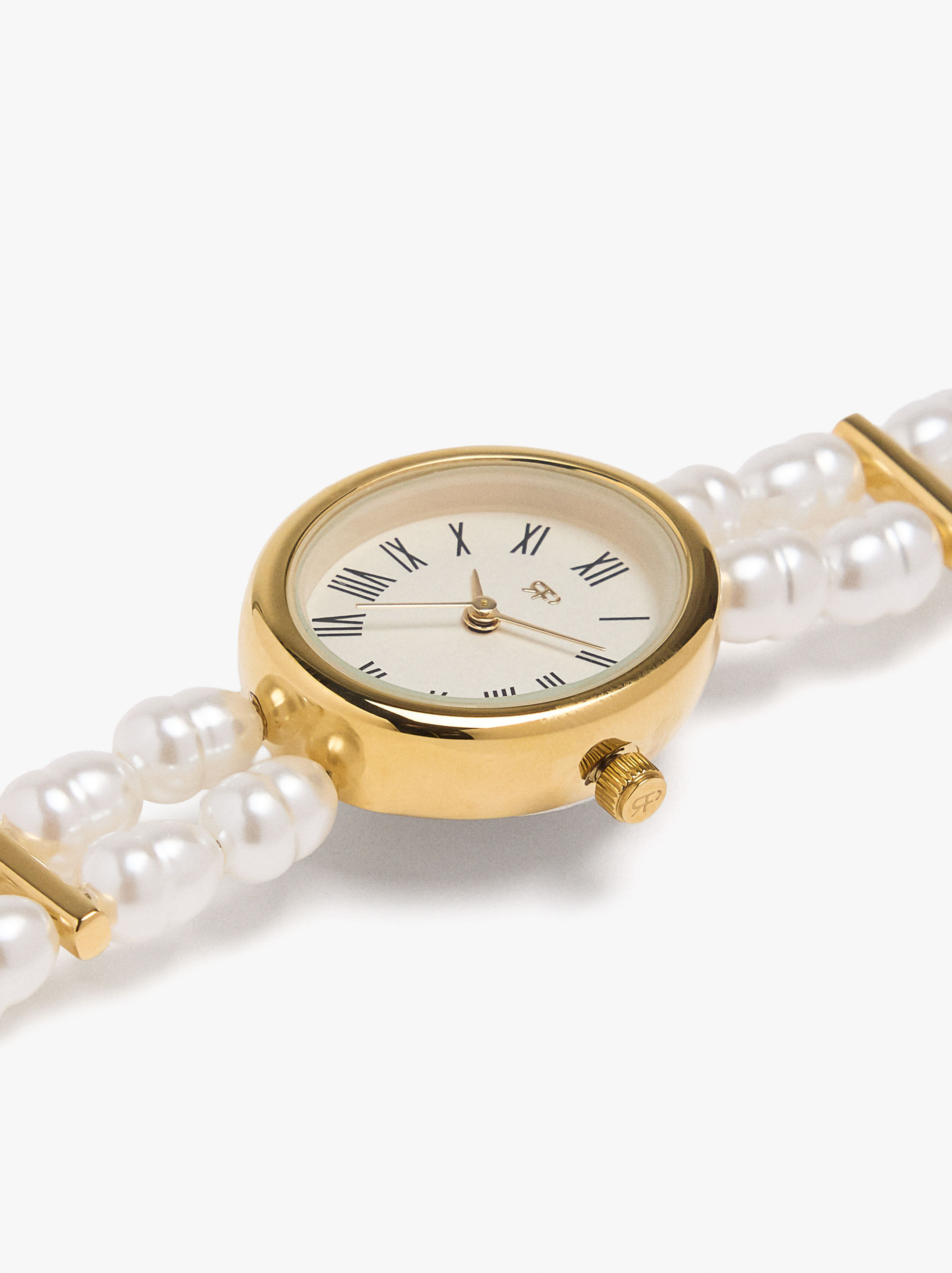 Uhr mit mehrfachem Perlenarmband