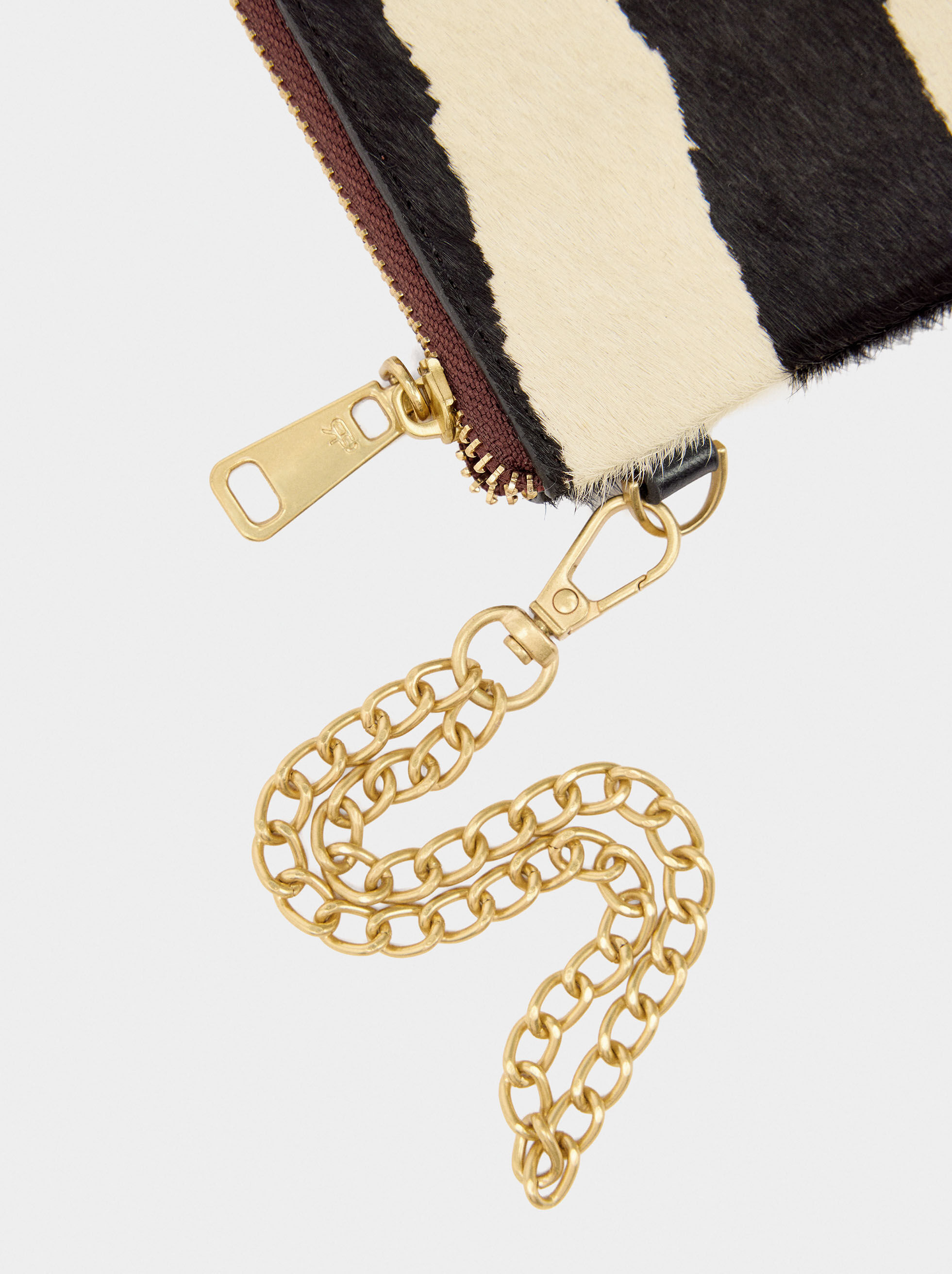 Multifunktionelle Lederhandtasche mit Pelz und Tiermuster