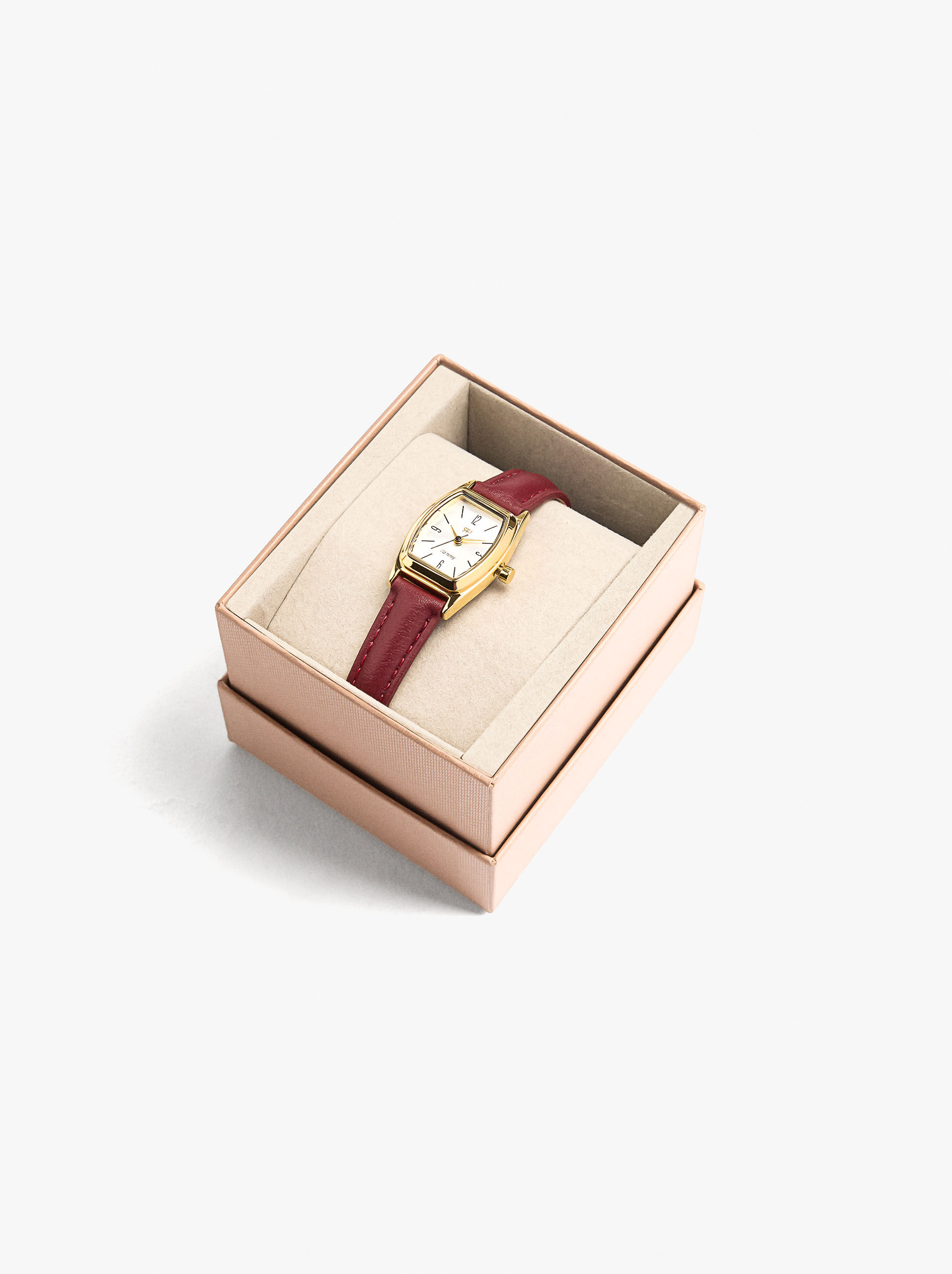 Runder Uhr mit texturiertem Armband